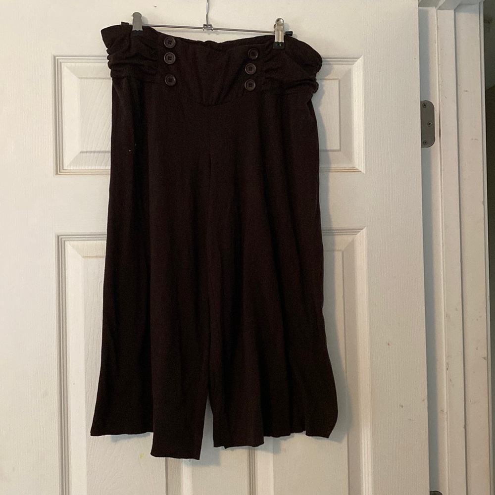 Brown flared stretchy capri pants with button detailing